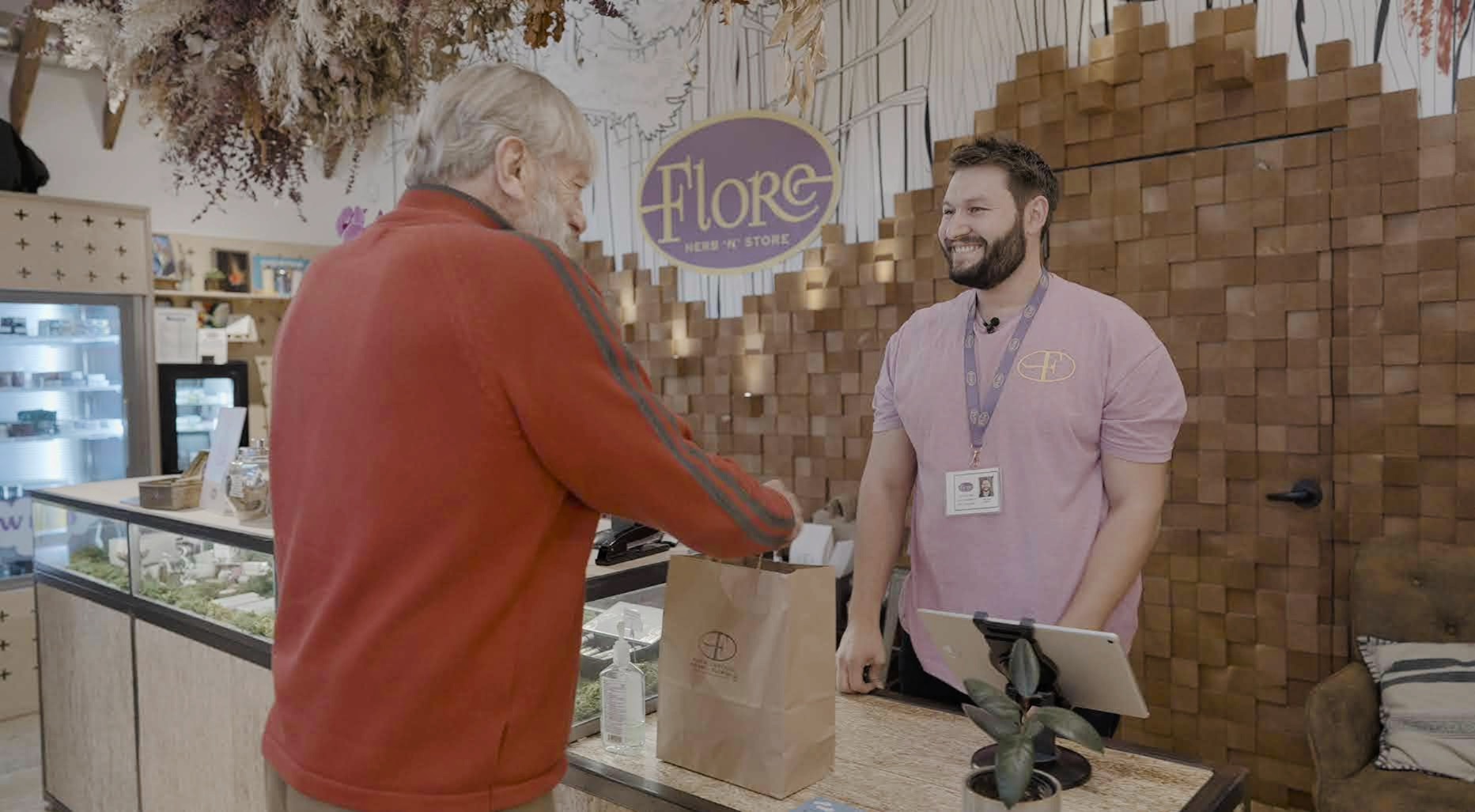 Wayne Justman picks up his compassion donation at Flore dispensary in San Francisco.