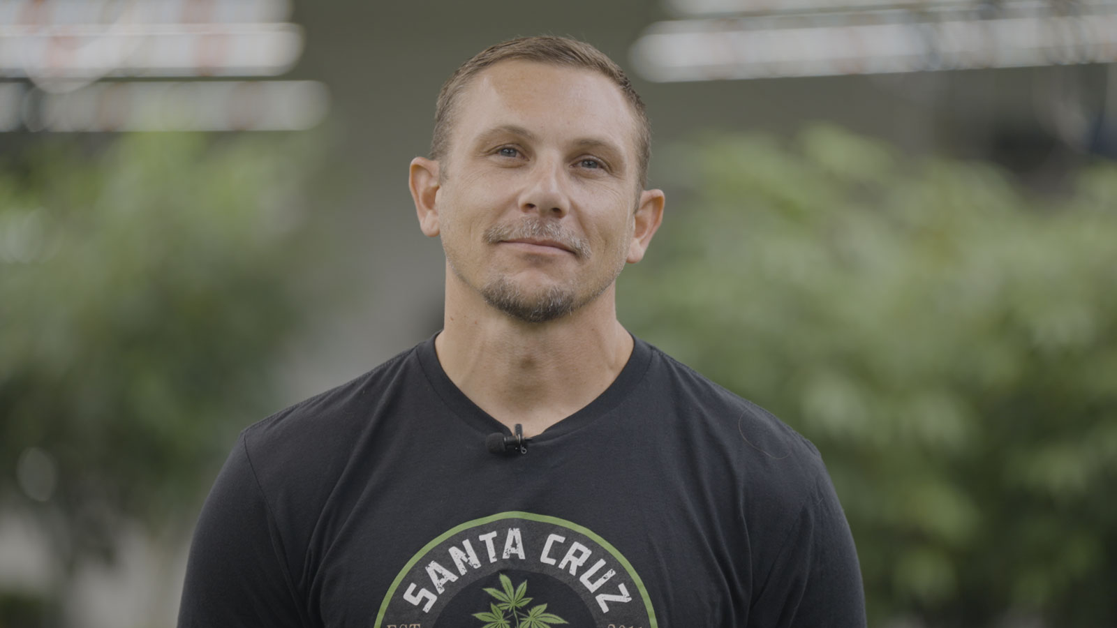 Aaron Newsom of Santa Cruz Veterans Alliance stands in the company's Watsonville cultivation center.