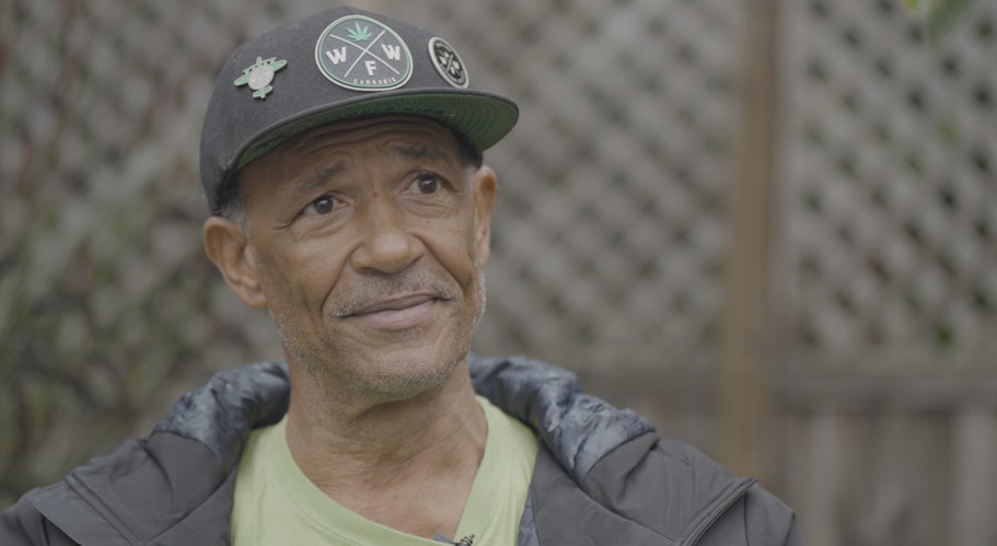 Image of Jerry Flagg outside Cultivate Dispensary in Santa Cruz, California wearing a Weed for Warriors hat